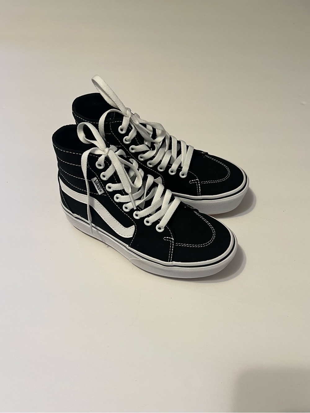 Vans Black and White High-Top Sneakers